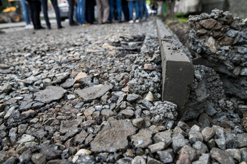 Repair of Ramps and sidewalks for the disabled. Renovation of the road. New asphalt pavement. Asphalt road repair. The details of the repair of asphalt roads.