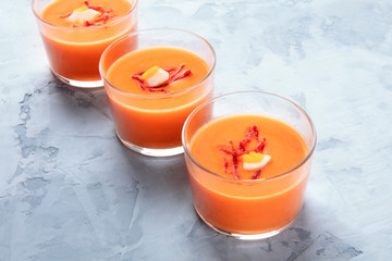 Salmorejo, Spanish chilled tomato and bread soup, served in glasses, with a place for text