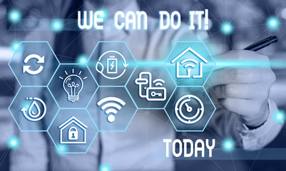 Text sign showing We Can Do It. Business photo showcasing see yourself as powerful capable demonstrating Female human wear formal work suit presenting presentation use smart device