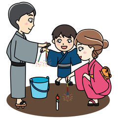 手持ち花火を楽しむ家族