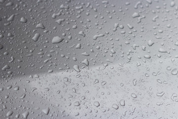 Water droplets on a gray background 