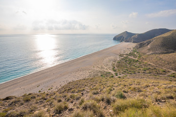 Beach of the Dead from top of the mountain, in Gata Cape Natural Park (Cabo de Gata in Spanish), famous wild touristic destination, in Almeria (Carboneras, Andalusia, Spain, Europe) 