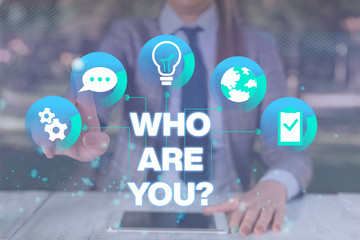 Text sign showing Who Are You Question. Business photo showcasing asking about someone identity or...