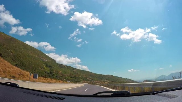 Timelapse footage from car dashboard at Moreas Highway located at Peloponnese, Greece