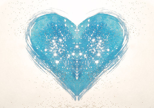 Gold glitter on abstract blue watercolor heart on paper in nostalgic colors