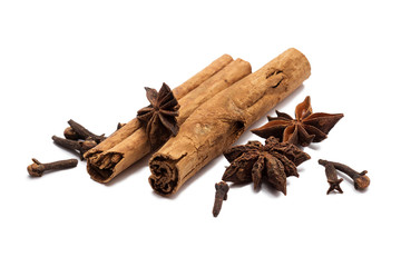 cinnamon, star anise, cloves on white background isolate
