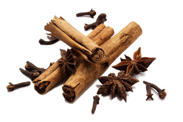 cinnamon, star anise, cloves on white background isolate