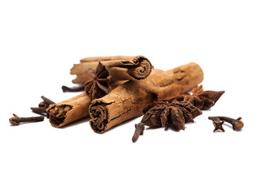 cinnamon, star anise, cloves on white background isolate