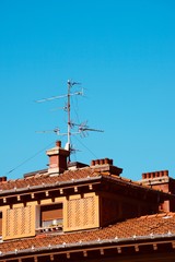 television antenna on the roof of the building