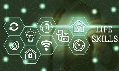 Text sign showing Life Skills. Business photo text skill that is necessary for full participation in everyday life Female human wear formal work suit presenting presentation use smart device