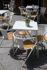 Chairs and tables on a terrace of a restaurant