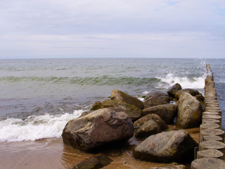The shore of the Baltic Sea. Stones and Breakwaters