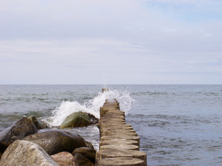 Fototapeta premium The shore of the Baltic Sea. Stones and Breakwaters