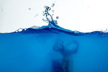 blue water surface with splash