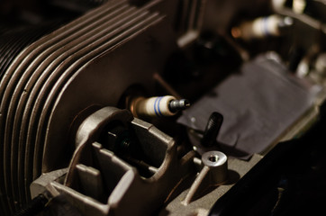 old engine with visible spark plug