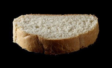 Bread slice isolated on black background