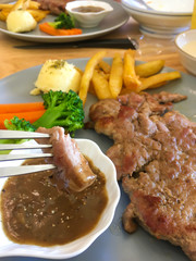 Steak, Mash potato, Vegetable, Sauce, on plate.