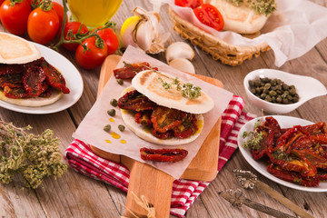 Tigella bread with sun-dried tomatoes. 