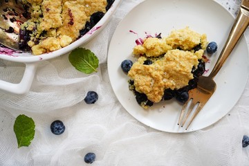 Homemade Blueberry cornmeal Cobbler baked in a Ramekin