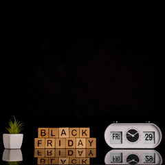 Front view of black friday word with copy space