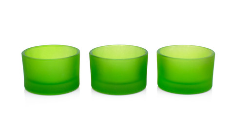green plastic cups isolated on white background