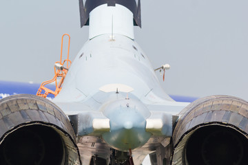Fototapeta na wymiar Back view of the jet fighter - shot of the turbines
