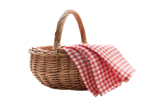 Red napkin and picnic basket isolated on white.