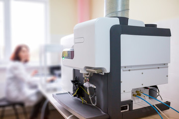 The laboratory scientist work with microwave plasma atomic emission spectrometer (MPAES) for...