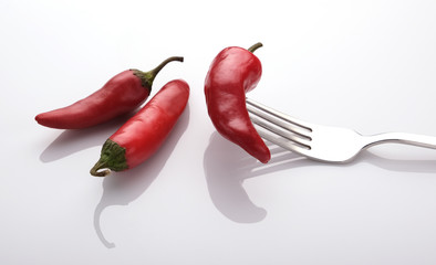 three red hot chili peppers