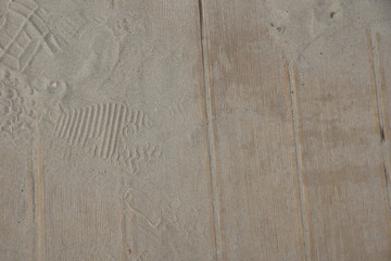 Fototapeta na wymiar wooden platform in the sand 1