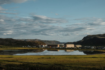 Summer landscape of the green polar tundra in the vicinity Teriberka