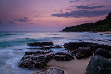 Fototapeta na wymiar slow shutter speed sunset on the beach at Koh Kood Thailand