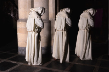 Monks in darkness