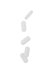 Pills in flight on a white background