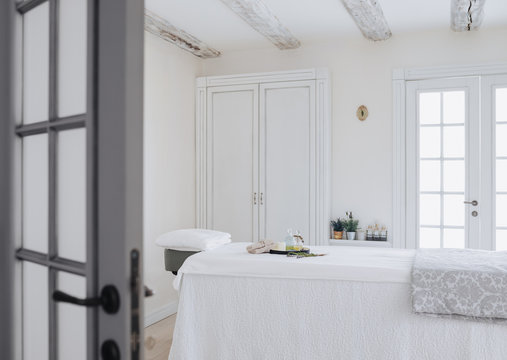 Massage Table At Luxury Spa Salon Interior.