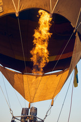 Obraz premium Heated air in a balloon using a burner fire.
