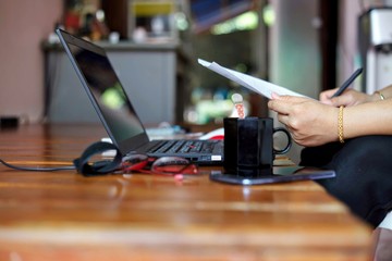 man working on tablet computer