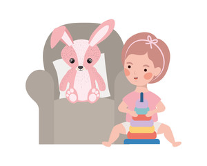 cute little girl baby with rabbit stuffed in sofa character