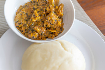 Nigerian Pounded Yam served with Spicy Bitterleaf soup