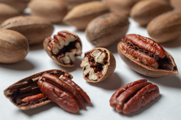 Group of pecan nuts on the white background