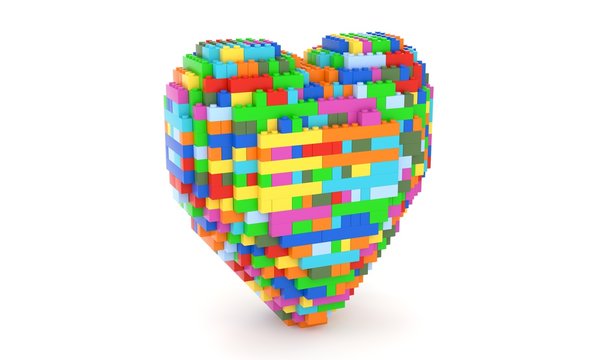 Toy bricks building a heart shape in multiple colors. Diversity image concept. Part of a series.