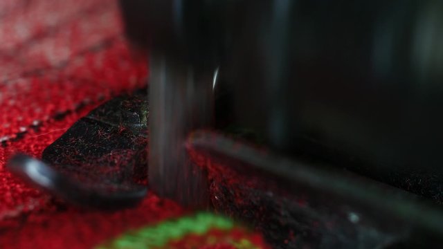 Retro overlock sew machine is working macro shot