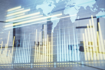 Stock and bond market graph and world map with trading desk bank office interior on background. Multi exposure. Concept of international finance