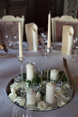 elegant wedding serving with white roses and candles