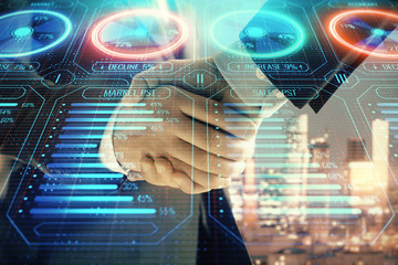 Double exposure of business theme drawing on cityscape background with handshake. Concept of...