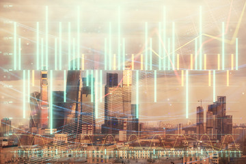 Double exposure of financial graph on downtown veiw background. Concept of stock market research and analysis