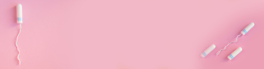 tampons on a pink background. 