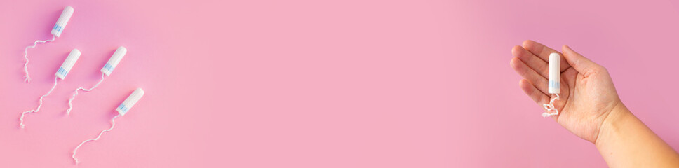 tampons on a pink background. 