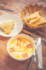 Hummus Pureed chickpeas, tahini, lemon, garlic drizzled with extra virgin oil served with pita bread