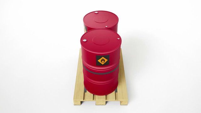 Two metal red barrels with flammable symbol, located on wooden pallet, isolated on white background. Barrels are strapped by tape, fillers on top. Camera tilt movement. 60 fps animation.